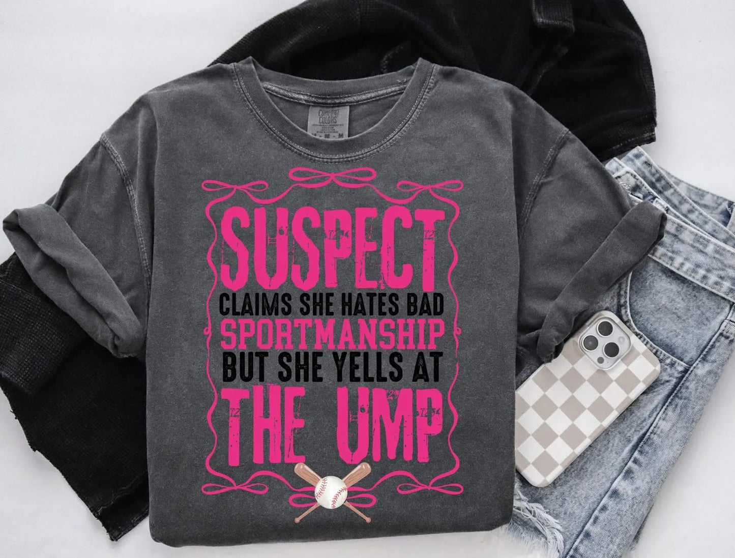 Suspect claims she hates bad sportsmanship shirt