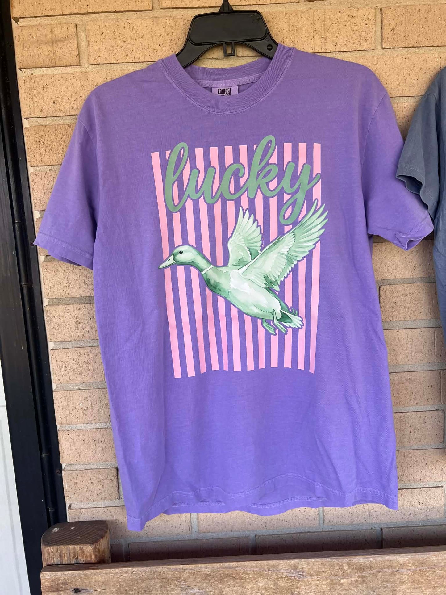 Lucky duck with pink stripped background tee